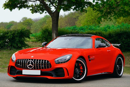 A stunning luxury red sports car parked on a scenic road in the UK.